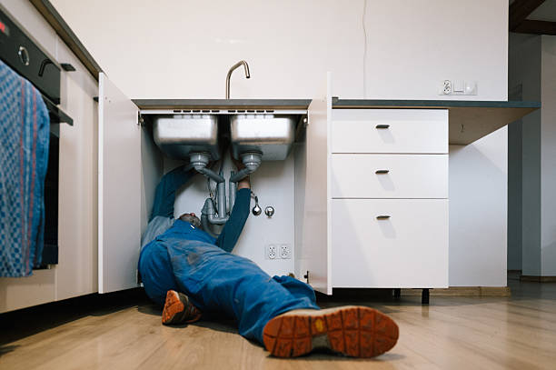 Professional Emergency Plumber technician working in Garrison, MO